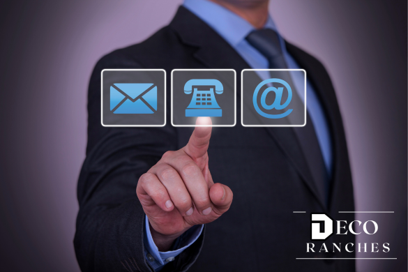 Person in a suit interacting with contact icons on a screen, with 'Deco Ranches' logo.